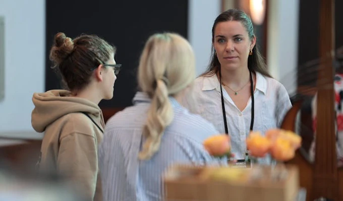 IMage of three women in discussion