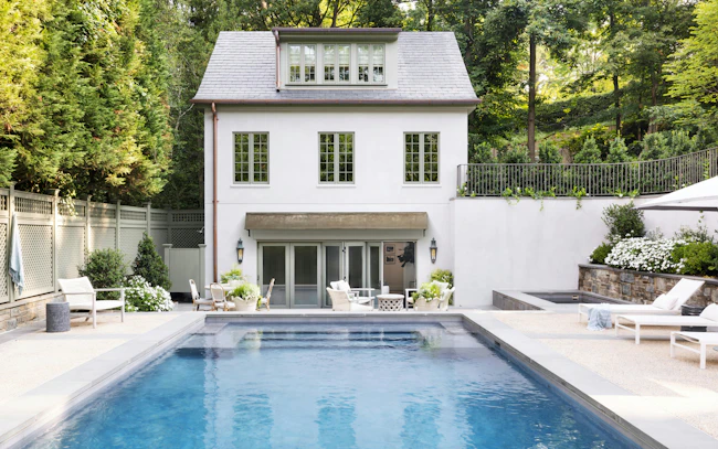 In their third round of renovations at this Washington D.C. Tudor, BarnesVanze designed a 1,200-square-foot structure that acts as a guest suite, pool house, and garage in one.