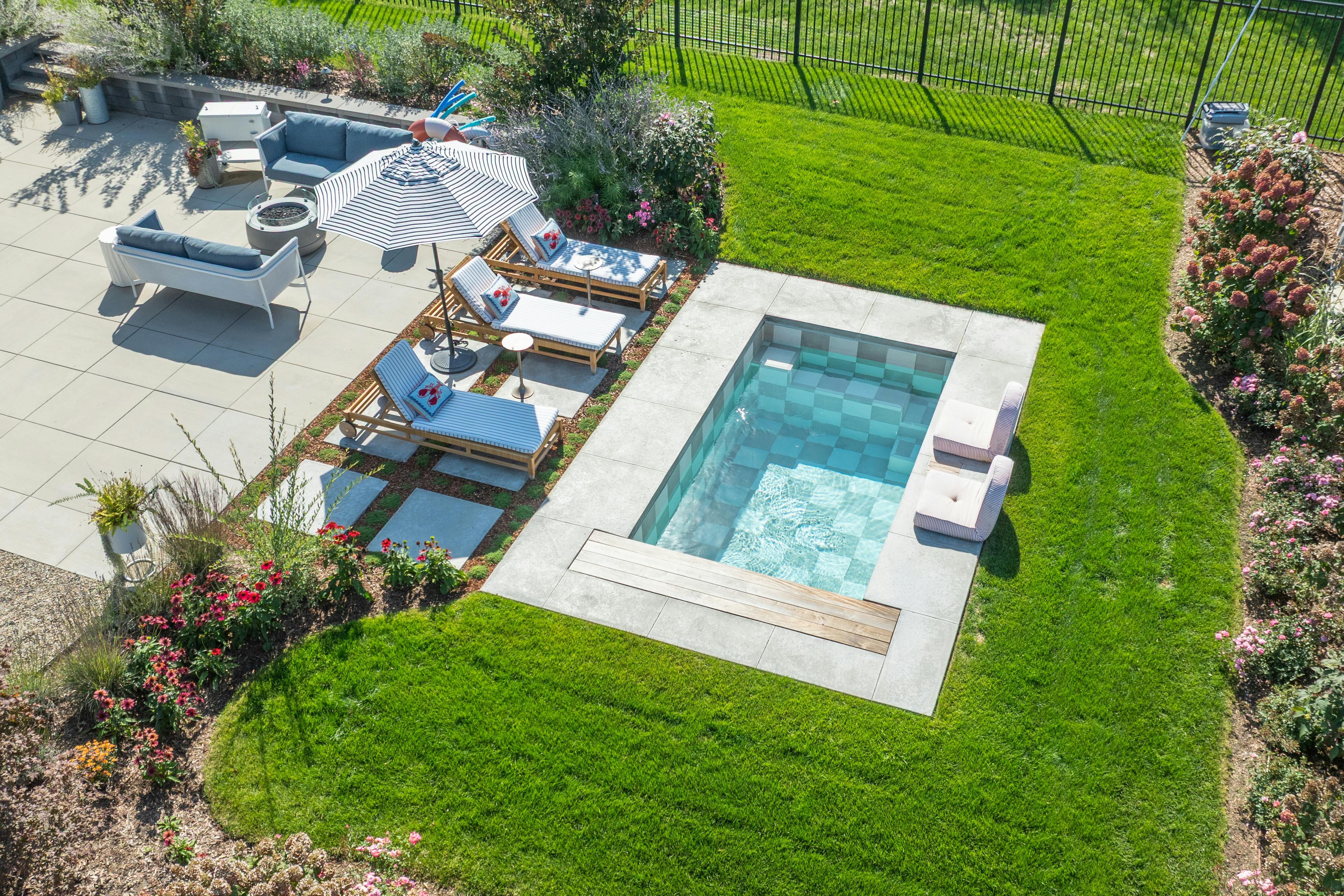 Aerial drone photo of a soake plunge pool in a Michigan back yard