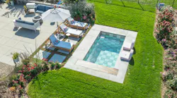 Aerial drone photo of a soake plunge pool in a Michigan back yard