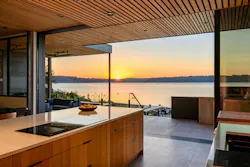 One way the team connected the indoor and outdoor spaces was by continuing the floor and ceiling materials throughout both areas.