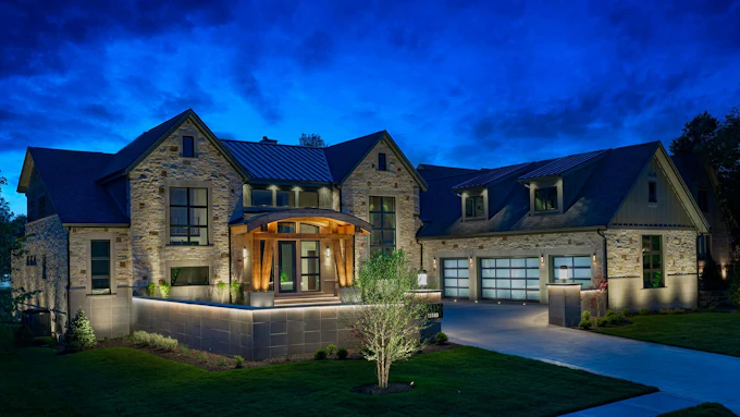 Exterior lighting on a luxury stone home