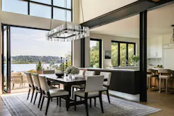 The added foot of ceiling made room for glass above the doors, and the view south.
