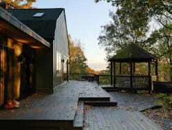 To keep with its existing character, orignial elements—including the shape of the barn and a moss-covered gazebo—were left intact.