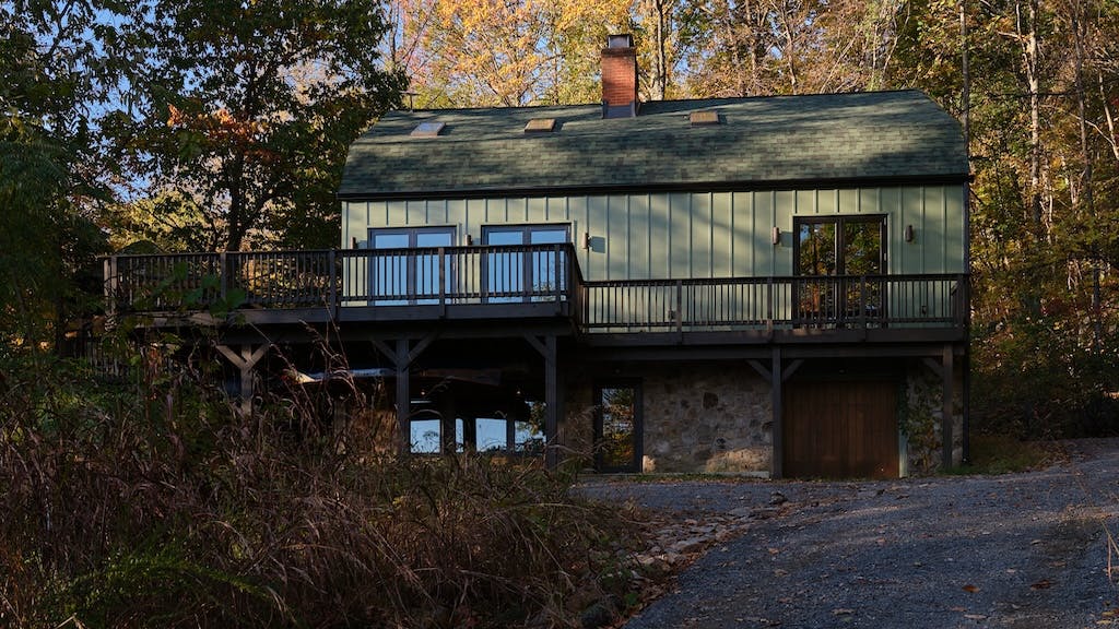 Once a rundown barn, a 3,000-square-foot structure overlooking the Shenandoah Valley now serves as a modern retreat.