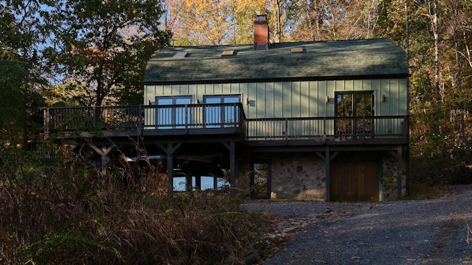 Once a rundown barn, a 3,000-square-foot structure overlooking the Shenandoah Valley now serves as a modern retreat.
