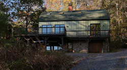 Once a rundown barn, a 3,000-square-foot structure overlooking the Shenandoah Valley now serves as a modern retreat.