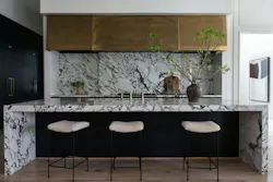 Kitchen with sliding marble backsplash closed