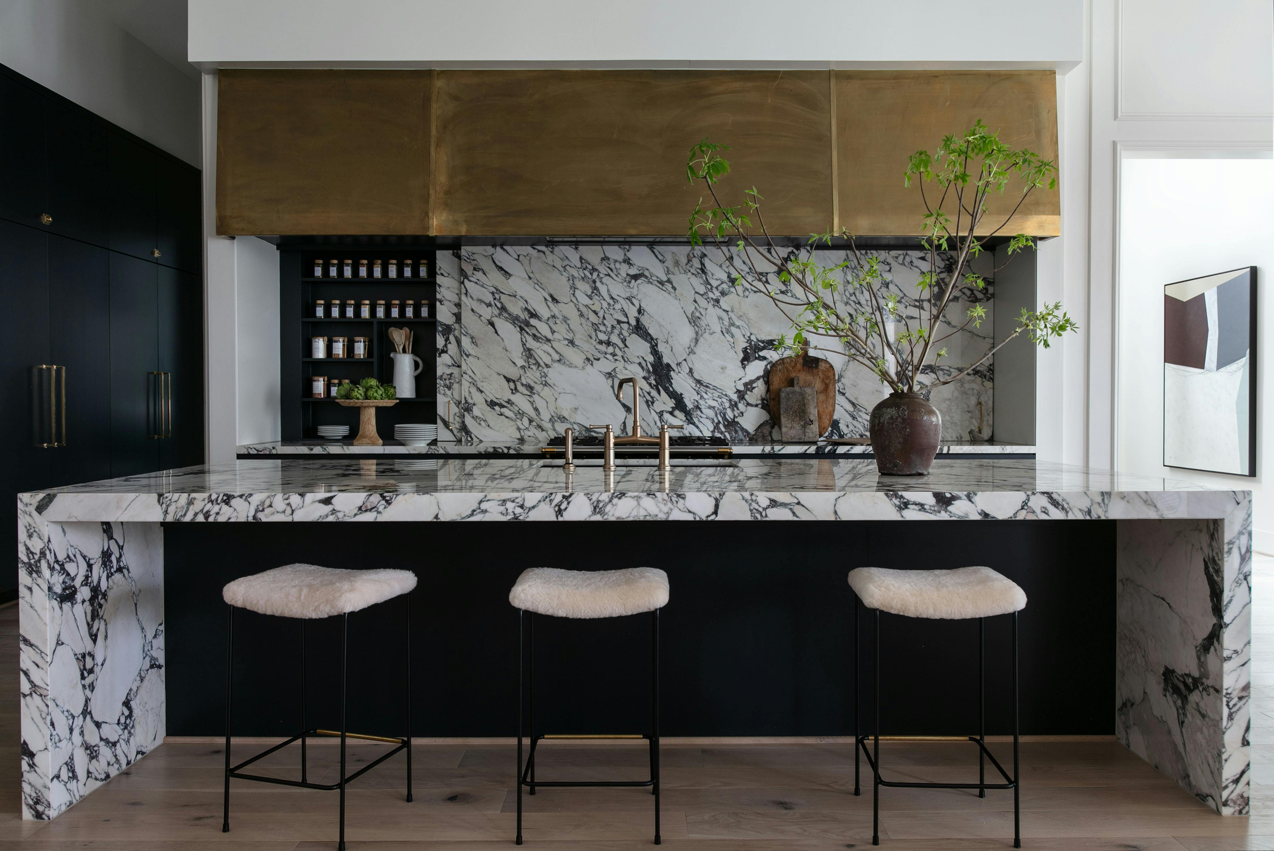 Kitchen with sliding marble backsplash open