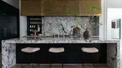 Kitchen with sliding marble backsplash open