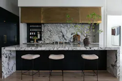 Kitchen with sliding marble backsplash open