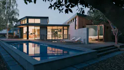 Rear elevation of a Los Altos Calif home showing a courtyard and pool
