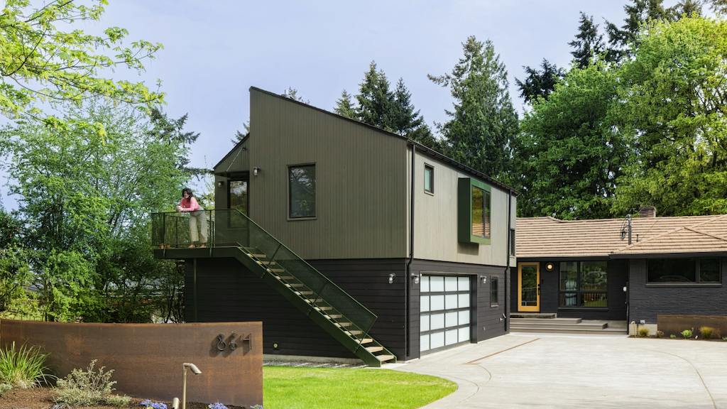 This above-garage ADU features a series of designer products to bring the homeonwers' vision of a fun and functional guest retreat to life.