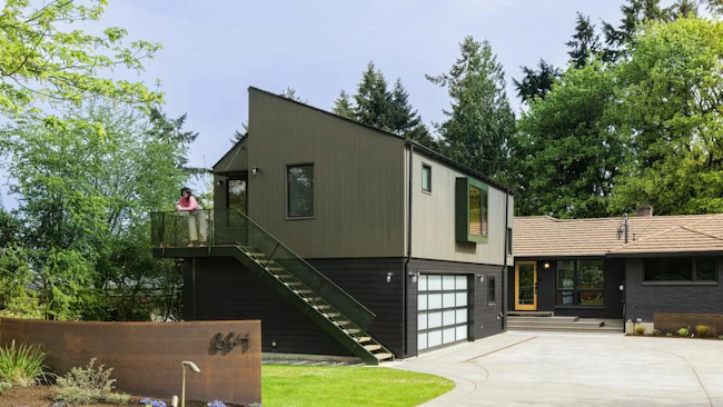 This above-garage ADU features a series of designer products to bring the homeonwers' vision of a fun and functional guest retreat to life.