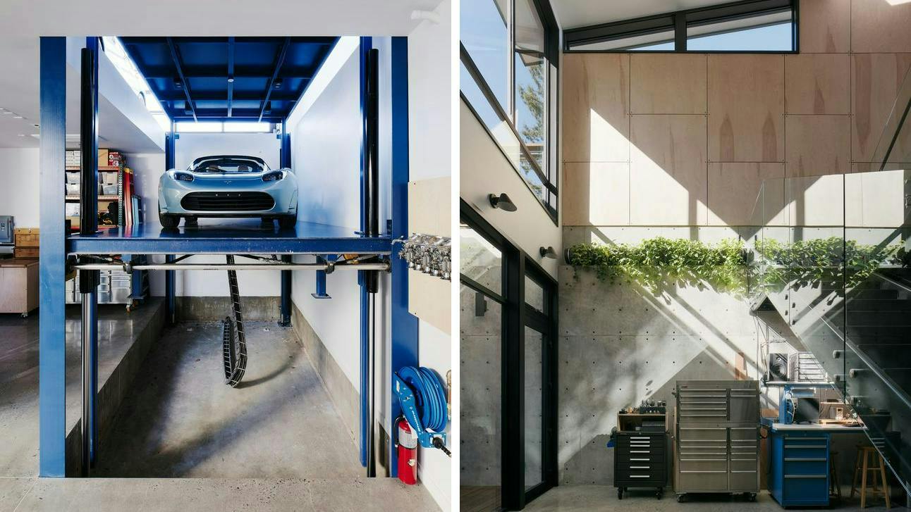 Interior of luxury Silicon Valley workshop with a car-lift and double height windows