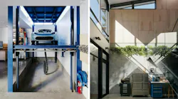 Interior of luxury Silicon Valley workshop with a car-lift and double height windows