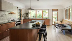 This 2,400-square-foot space was transformed from four cramped rooms to a modern kitchen and family room.